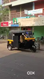 BAJAJ AUTO LTD, RE/AR, yellow black, petrol