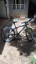 Btwin neon green and black bicycle