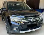 2023 Maruti XL6 Alpha AT (Midnight Black) in immaculate condition