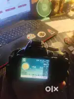 Nikon D3100 Dslr Camera With An 18 55Mm Af S Dx Nikkor Vr