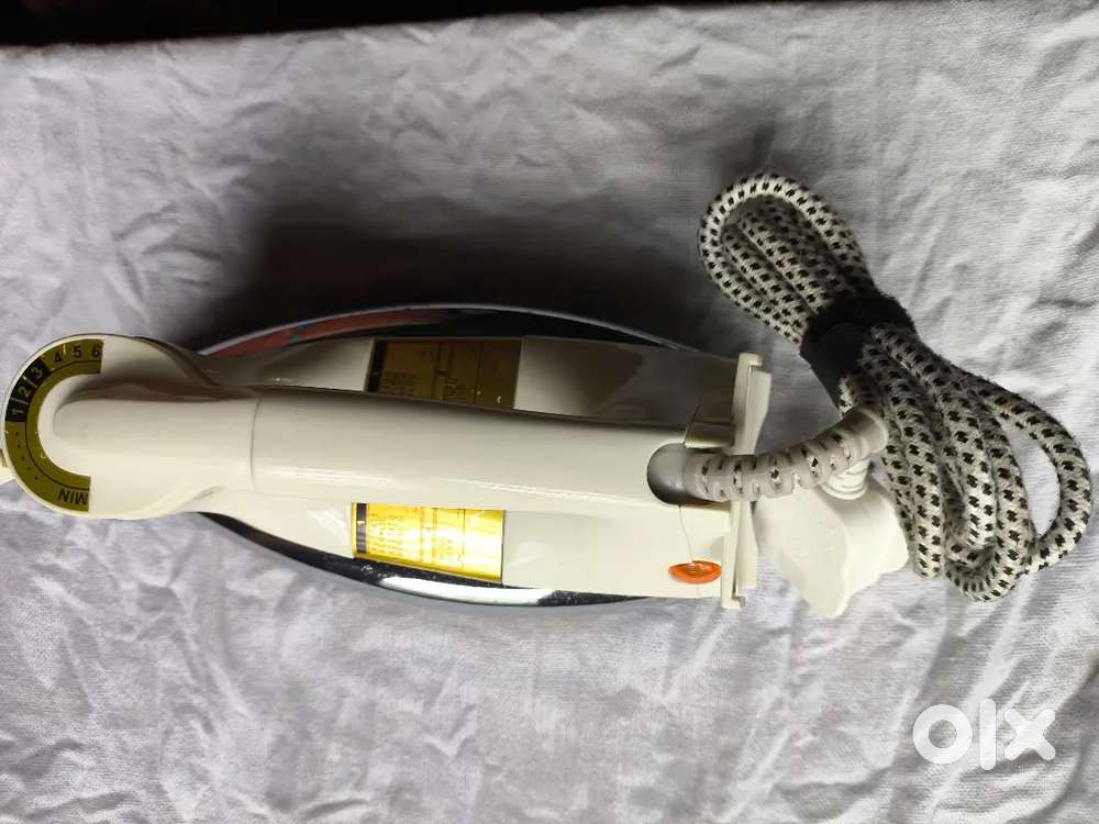 Electric Iron box Good condition.(1 week used)