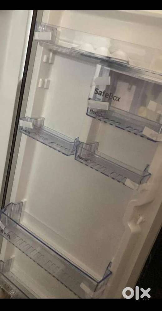 New voltas fridge with mint condition totally brand new with bill