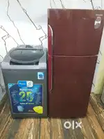 Samsung double door refrigerator and whirlpool top load washing machin