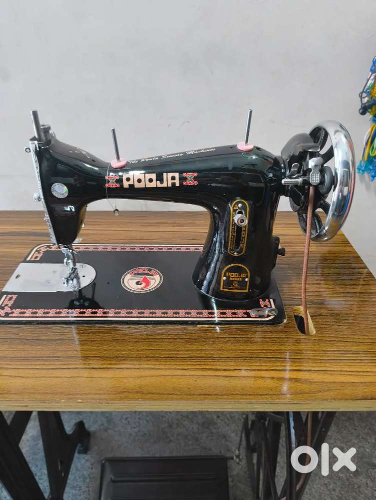 Pooja sewing machine.