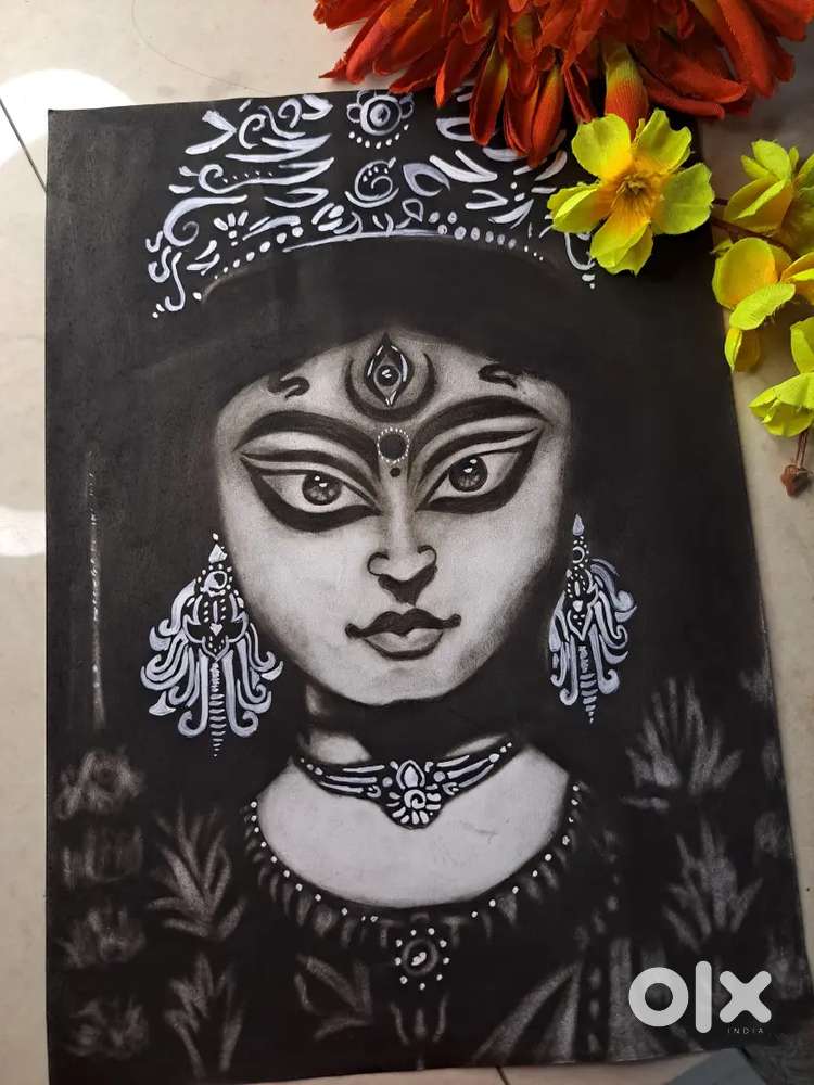 Charcoal sketch drawing of durga ma on A4 page