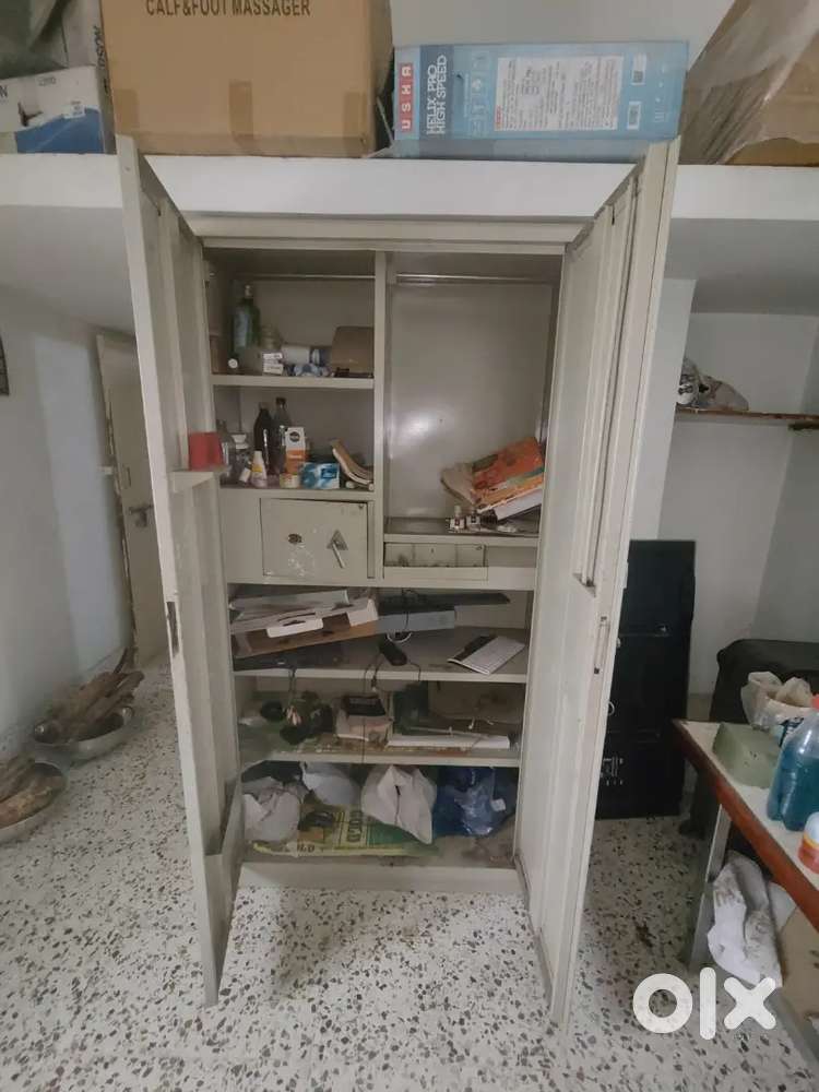 Steel cupboard, folding bed,scooty