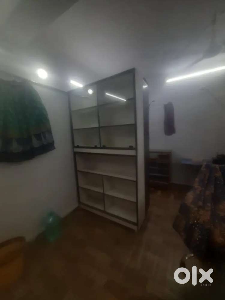 Wardrobe or shelf rack for tailor shop