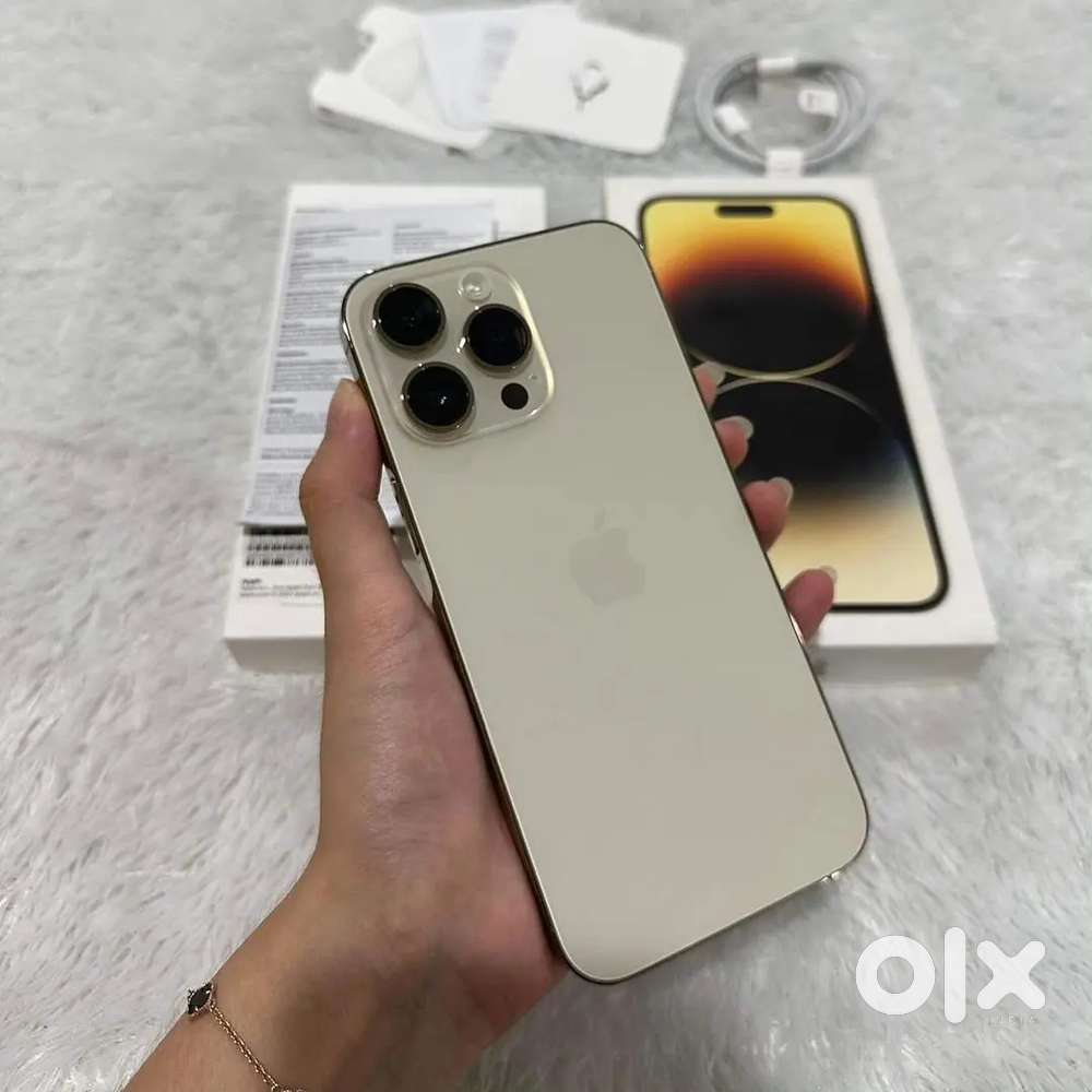 Selling my 4 months old I phone 14p in white colour/.Need urgent money