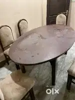 Teak wood original  oval donning table with 6 chairs