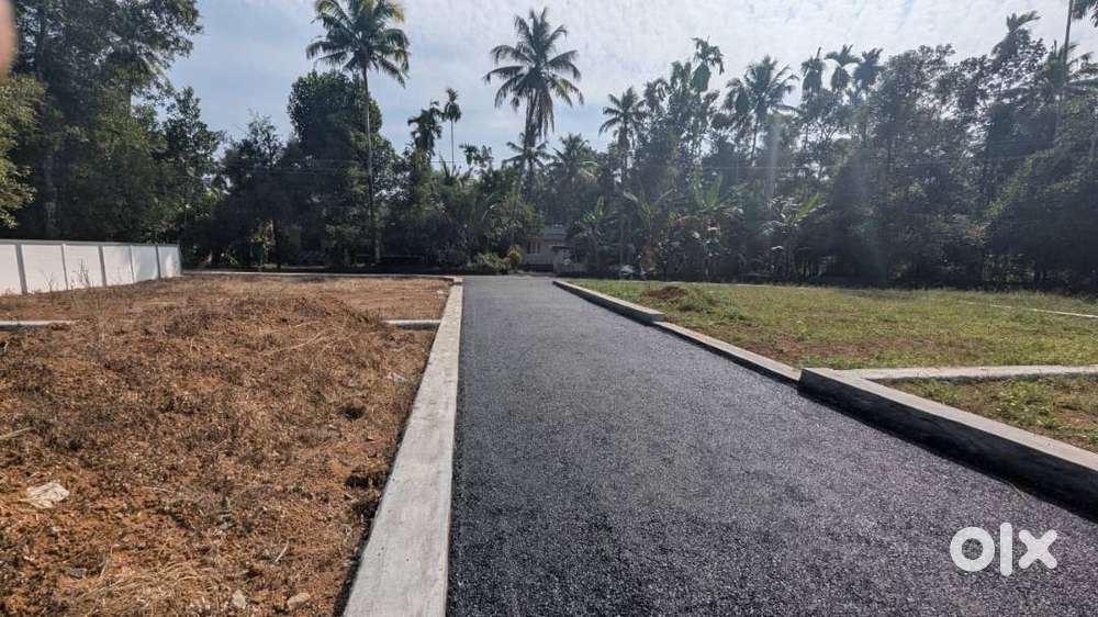 Karukutty–Adlux Apollo Near  5–15 Cent Premium House Plots  3L DP