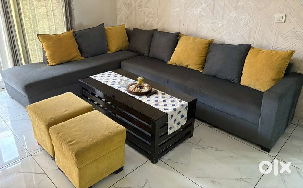 L shape grey sofa with center table