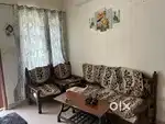 5 seater wooden sofa without table + 1000 with cover if needed