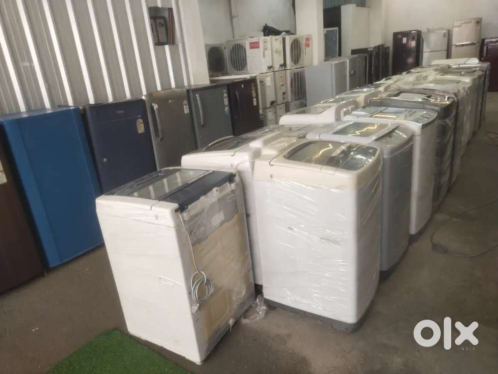 Second hand showroom washing machine toplod ***