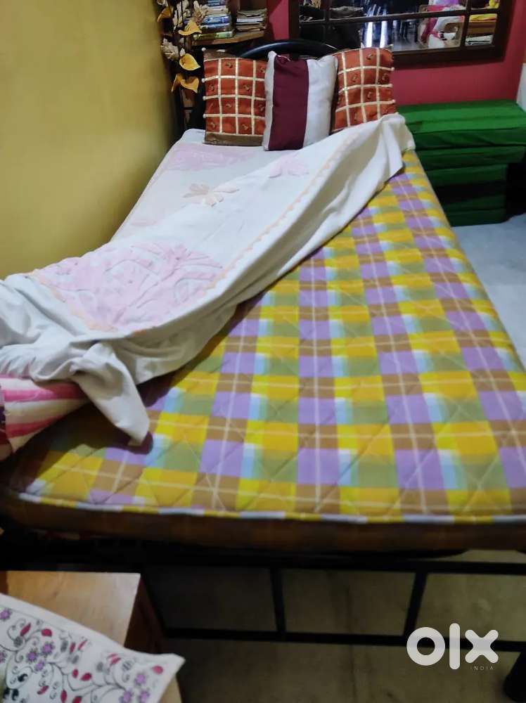 Wrought iron single bed in excellent condition