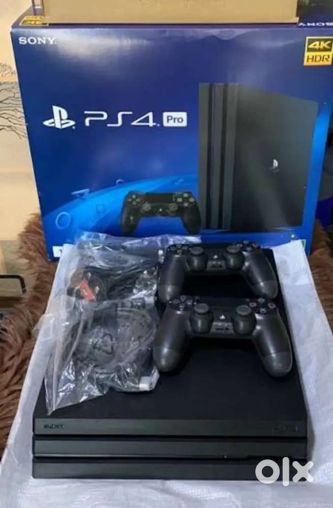 PS4 Pro (1TB) – Excellent Condition  2 Controllers  8 Games Included