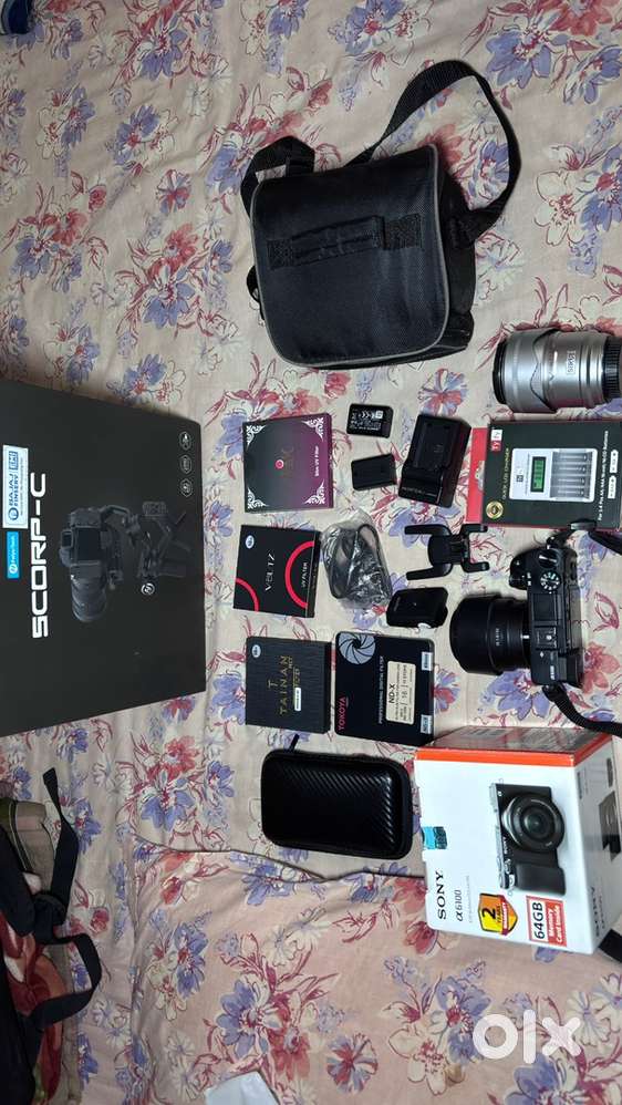 Sony a6100 4k mirrorless + Sirui 23mm 1.2f + Sony 50mm 1.8f + Scorp C