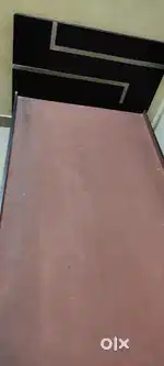 Single Cot and Two Table
