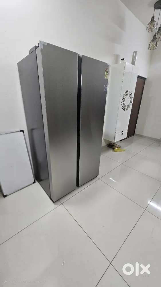 Almost New Samsung Refrigerator- side by side door with wifi