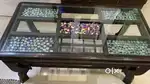 Glass Top Woodwn Center Table with decorative stones- Good Condition