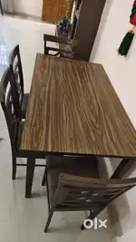 Wooden dining table with 4 Chairs.