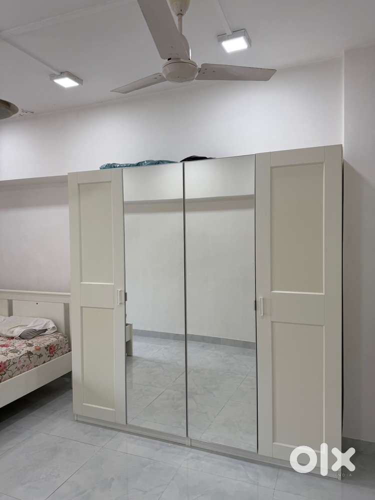 White Ikea wardrobe with mirrors