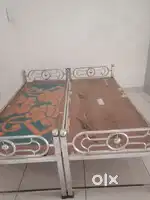 Two single beds with mattress