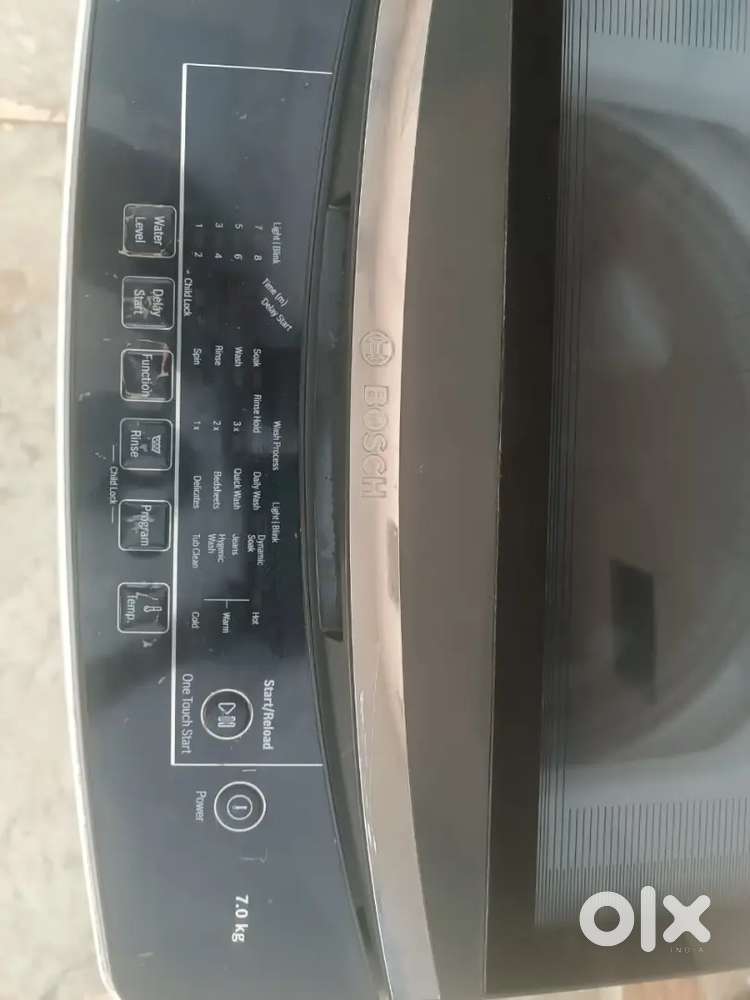 Bosch washing machine7 kg top load  fully automatic running condition