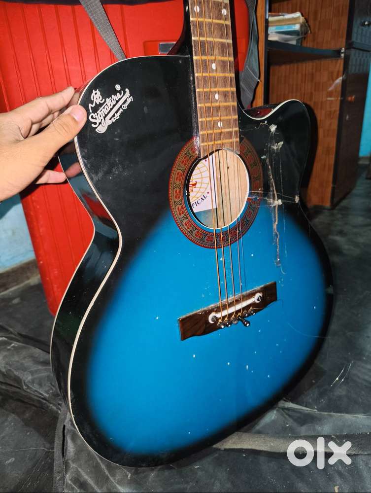 Signature acoustic guitar