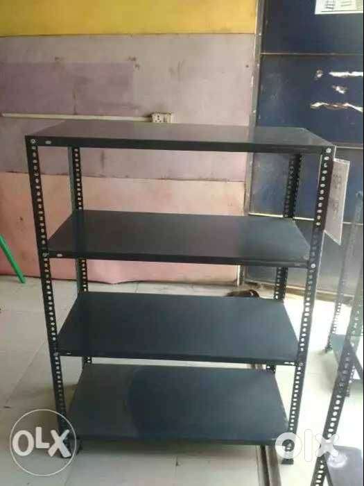 free home delivery. 4 shelf  NEW steel rack for sales