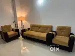 Classic beige/tan and dark brown wooden sofa