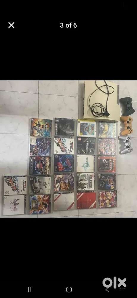 Ps3 with 6 controllers and 21 games changer and cabel