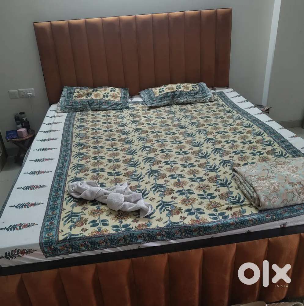 King size bed along with one full size mattress