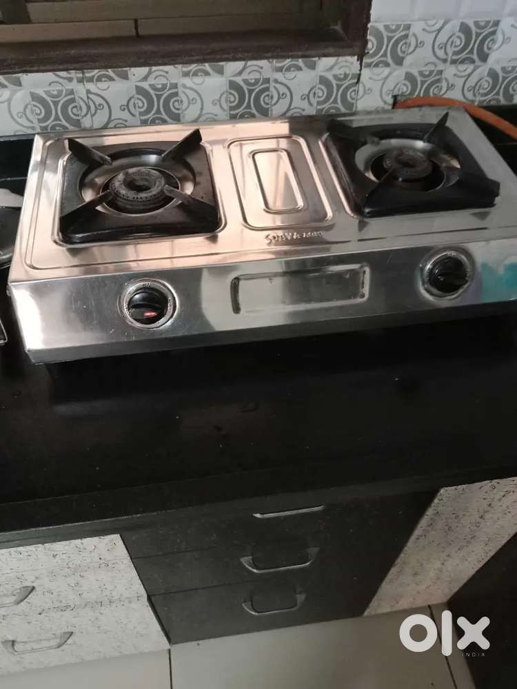 A Stans steel Surya brand Gas stove.