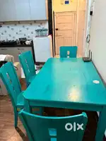 Wooden dining table with 4 chairs
