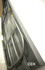 Iron bed with foldable legs