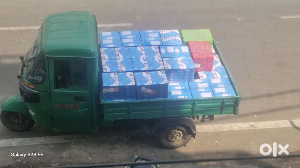 Delivery job of 3vehiler maxim loader delivering boxes of a4 paper