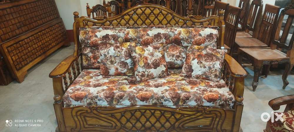 Teak wood sofa cumbed