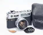 yashica electro 35 range finder 35 mm film camera and its flash light