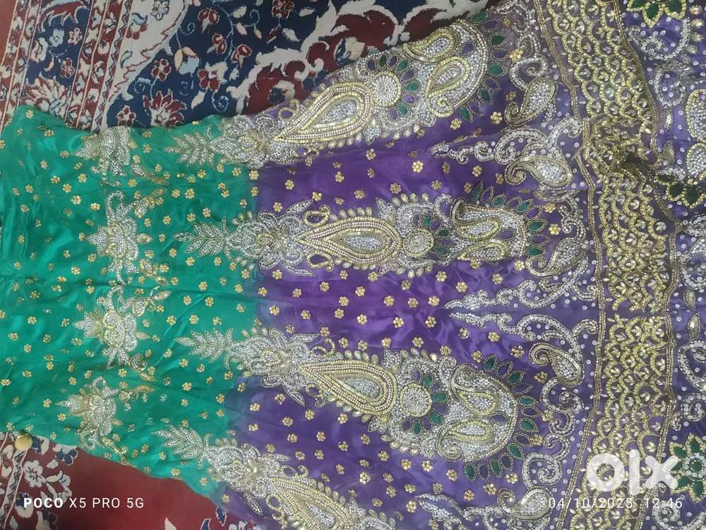 Net hand work lehnga