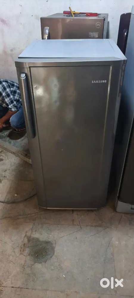 Samsung double door fridge good condition with warranty 1 year old