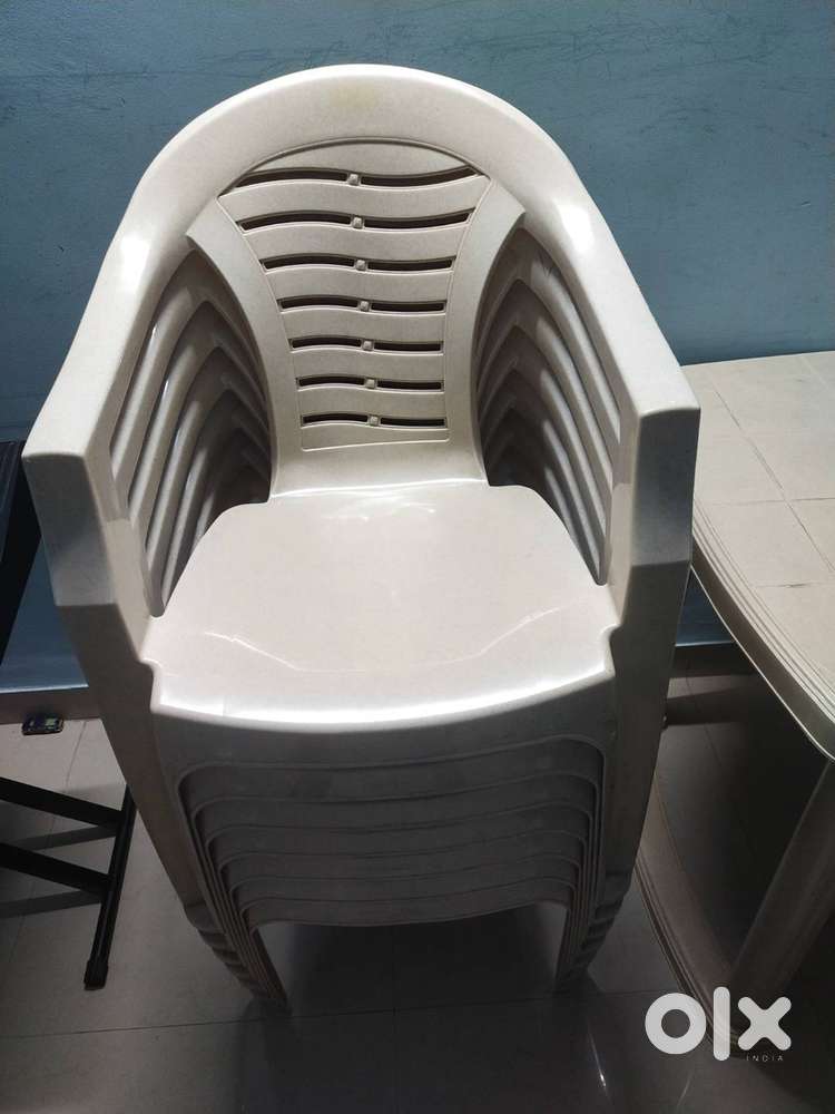 Nilkamal Table (3) and Nilkamal Chairs  with arm 5)