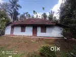 1.91-Acre Scenic Plot with House for Sale in Nadavayal Wayanad