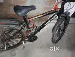21 speed cycle with disc brakes and suspension  2 year frame warranty