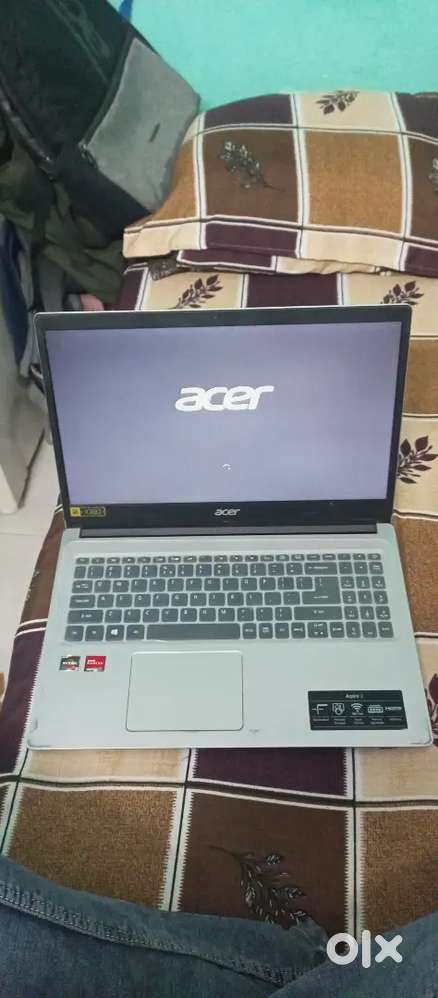 Good condition laptop with charger & bag of company