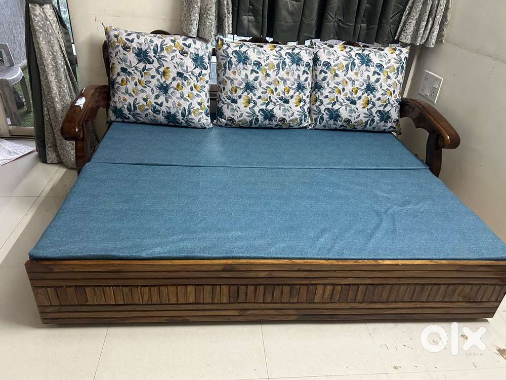 Wooden sofa cum bed