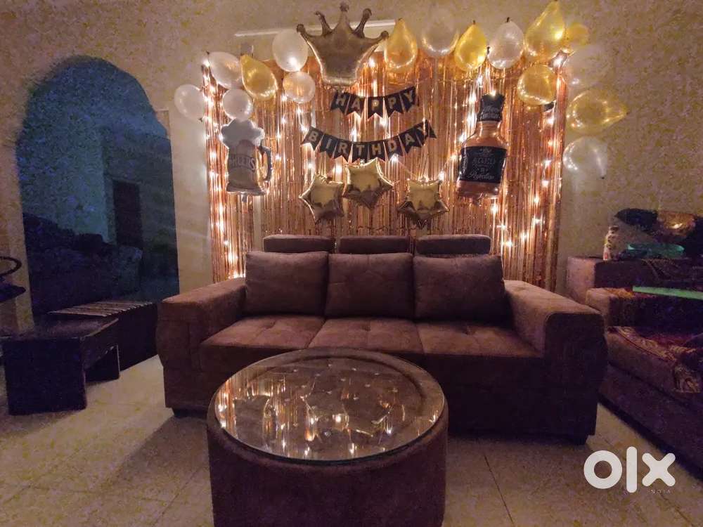 Sofa set of 5 with two puffies with table also