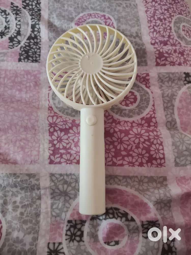 It's an electric hand fan with three different speed