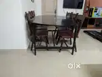 Used Dining Table with 6 chairs.