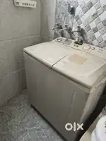 LG 6.5 kg TOP LOADING WASHING MACHINE