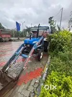 Tactor with loader